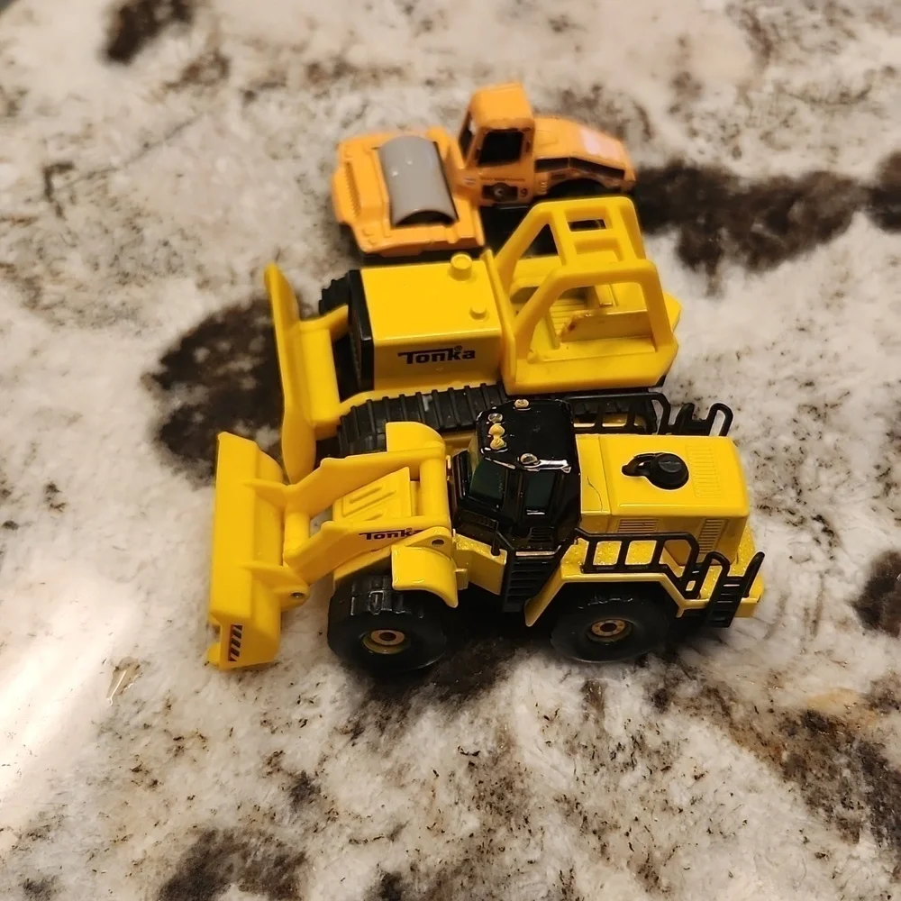 3 construction cars 2 Tonka and 1 road construction